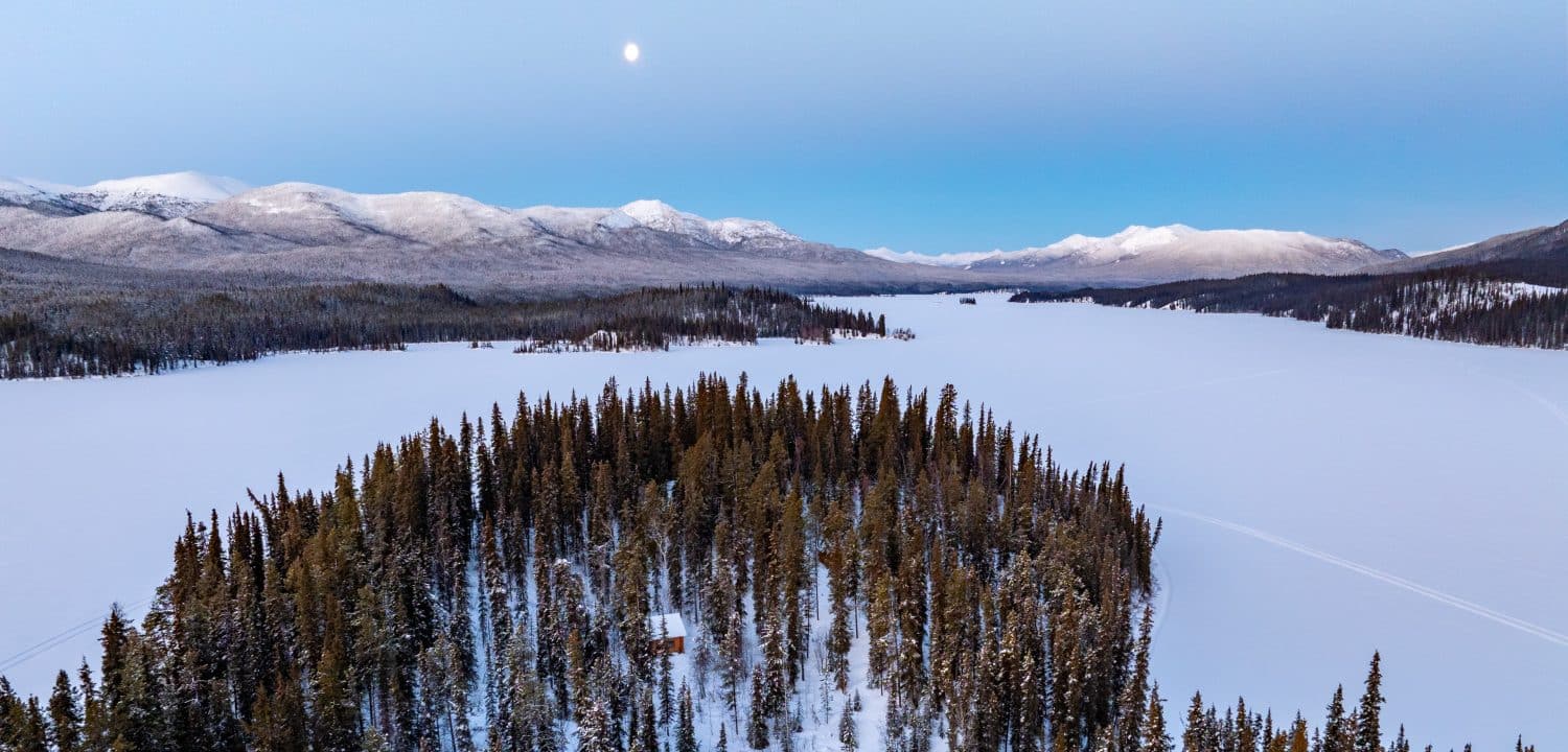 Moon over Big Salmon Lake Yukon winter